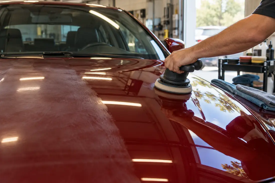 A car in a service bay or being detailed